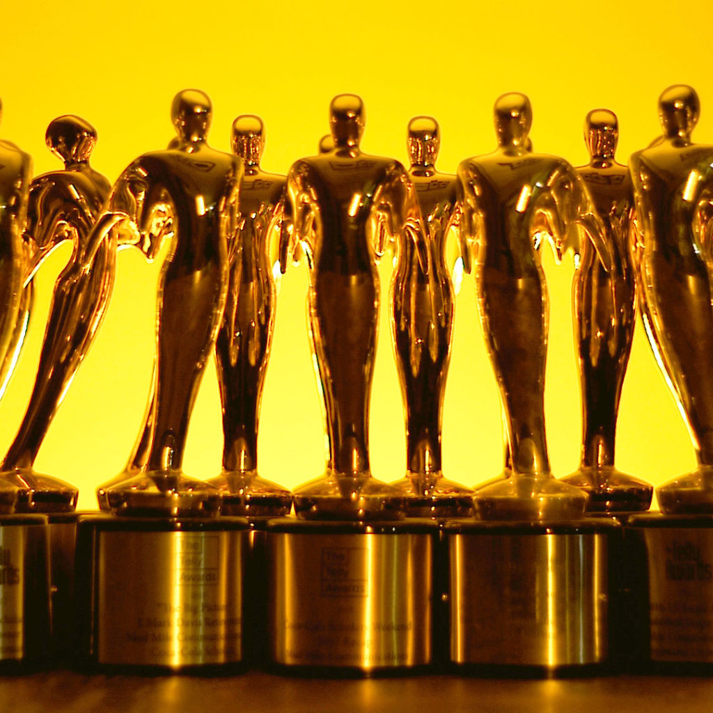 A picture of a group of Telly awards statues.